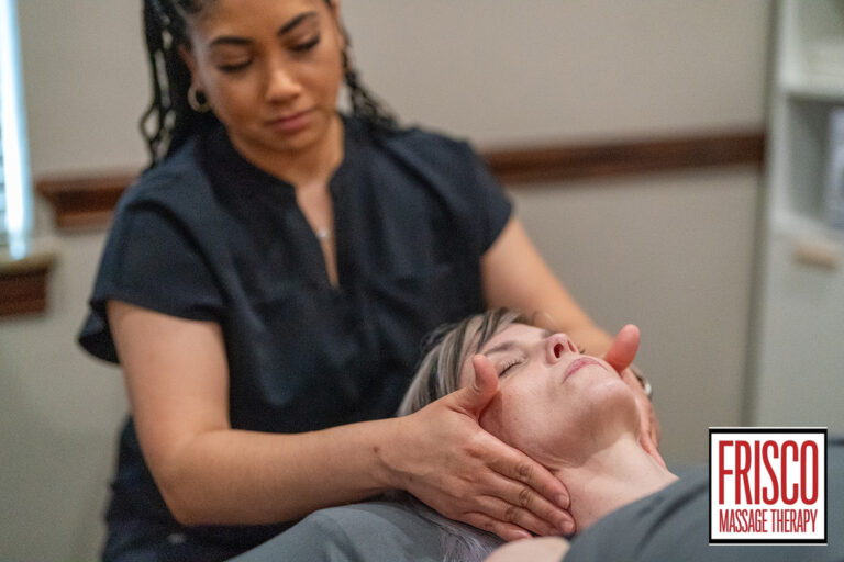 A massage therapist performs a therapeutic massage for jaw pain on a client lying on a table. The logo "Frisco Massage Therapy" appears in the lower right corner.